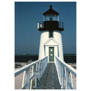 Fine art photograph of a white Nantucket lighthouse with a black cap standing against a clear blue sky on a bright New England day, a coastal architectural landmark printed as a 5x7 greeting card by Will Davis Studios.
