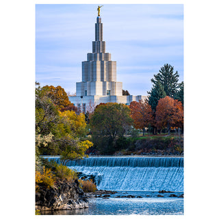 Modern architectural structure with a water feature and trees in the foreground