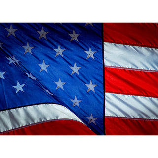 Fine art close-up photograph of an American flag with weathered stars and bold red, white, and blue stripes rippling in the wind, printed as a 5x7 greeting card by Will Davis Studios.