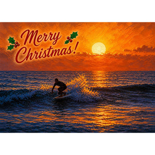 Surfing Christmas greeting card with a surfer riding a wave at sunset, golden light blazing across the ocean, and Merry Christmas lettering framed by holly and berries in an orange painterly sky. 5x7 card.