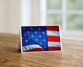 5x7 greeting card featuring a close-up photograph of the United States flag with stars and stripes in vivid red, white, and blue by Will Davis Studios.