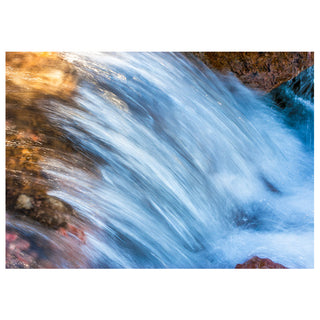 Close-up of a flowing stream with rocks Will Davis Studios