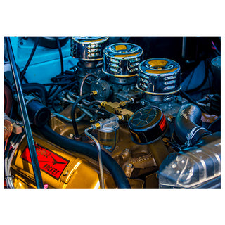 Close-up of a car engine with visible brand name on a white background photo by Matt Punches